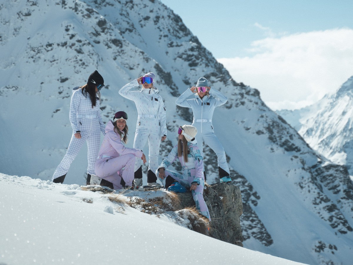 Women's ski wear, Winter fashion, White ski pants